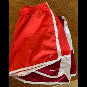 2 pairs women’s Nike shorts L coral and red